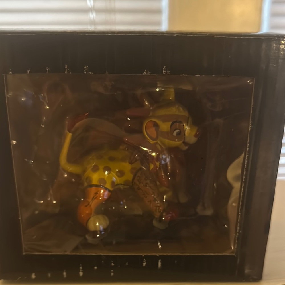 Simba Britto figurine
